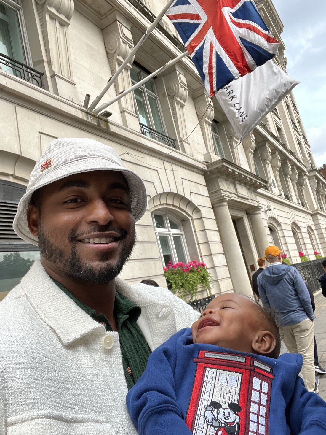 Brian Mays with his son in London, England